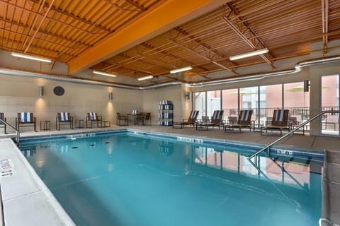 Dive into a bright indoor pool for carefree relaxation.