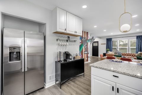 Coffee bar ready with mugs, Keurig, and Motown vibes