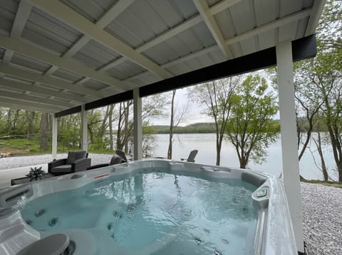 You cannot beat the river view from this 6-person hot tub! 