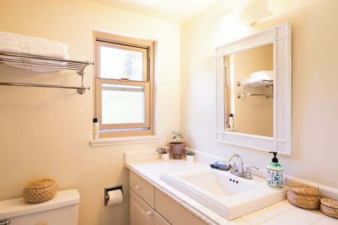 This cute bathroom is full of amenities for you to enjoy