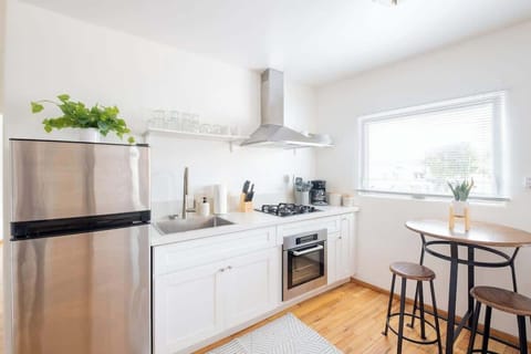 The stylish, streamlined kitchen comes fully equipped for your stay