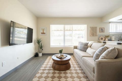 Put your feet up in the bright and airy lounge after a day at the beach