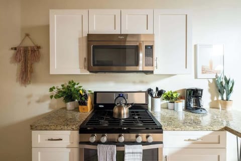 The compact kitchen comes fully equipped with everything you need