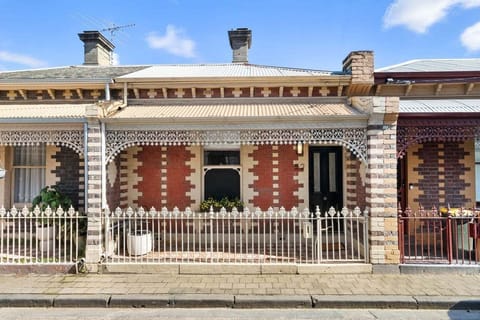 FRONT: Classic single fronted brick facade fronts a stylish renovated modern interior.
