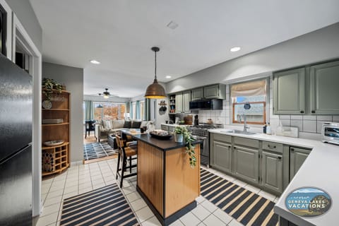 Kitchen with island and island seating
