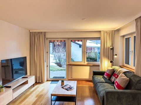 Furniture, Interior Design, Flooring, Couch, Floor, Room, Wood, Ceiling, Living Room, Television
