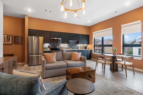 Modern open-plan kitchen with dining and lounge