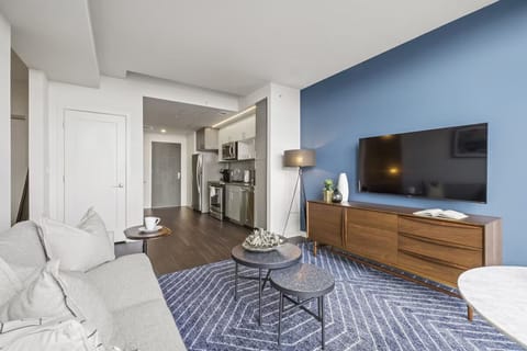 Settle in for movie nights with a sleek, open kitchen.
