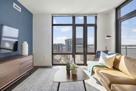 Soak up natural light while relaxing with the city outside.