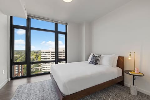 Wake up to sweeping views from crisp, cloud-soft bedding.