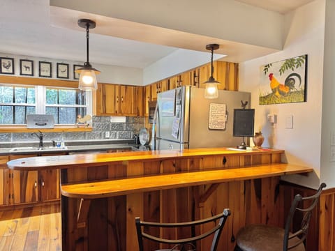 Kitchen bar for office work or a quick snack. 