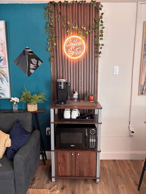 Coffee bar/reheat station. Complimentary coffee/tea, creamer and sugar provided.