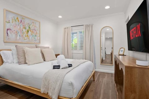 Enjoy the bedroom with fresh linens, smart TV, full mirror & blackout curtains.