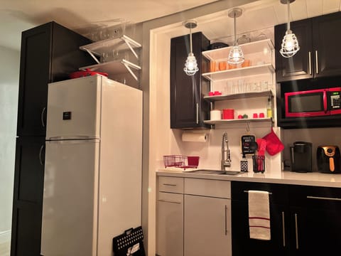 Kitchenette has pantry, fridge and fully stocked for light cooking