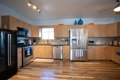 Kitchen | Fully stocked with cooking essentials and modern appliances.