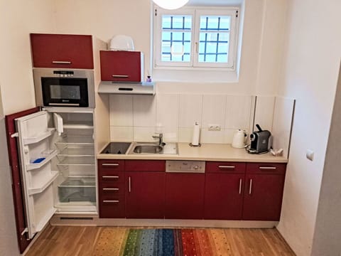 Major Appliance, Kitchen Appliance, Wood, Kitchen, Flooring, Cabinetry, Floor, Countertop, Kitchen Sink, Interior Design