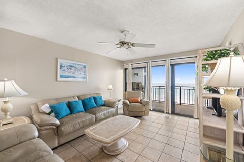 Relax in this coastal living room with ocean views and comfortable seating.