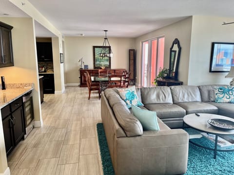 Great room plenty of seating 75 TV 30 ft of Glass facing the Beach