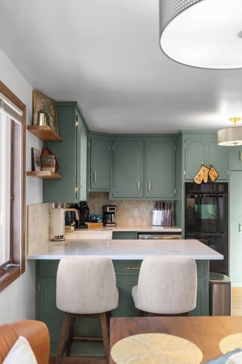 Sweet little coffee bar with Keurig and coffee maker.