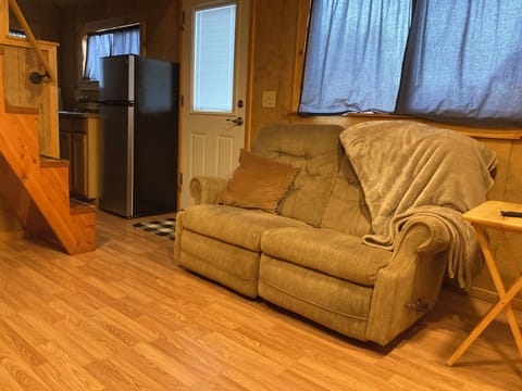 A cozy living room with a La-Z-Boy reclining loveseat.