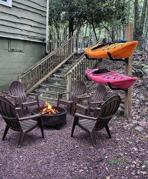 Side of house / driveway
Adirondack chairs + firepit
2 kayaks and life jackets