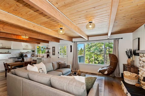 Enjoy the lake view from our great room and get comfy in our wicker swing.