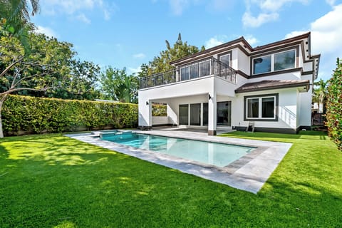 My favorite part of this house is the backyard pool and patio