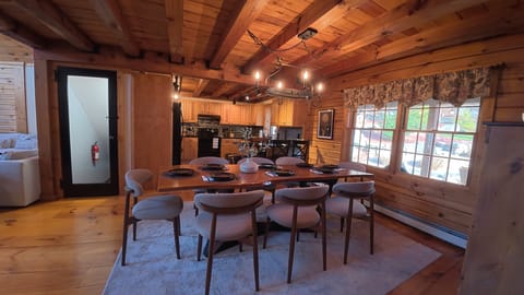 Live edge table. Seats 8 comfortably at the table, with 3 additional bar seats