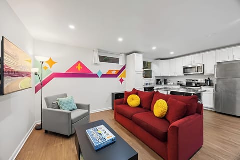 Living Room - Unit 1: Enjoy modern comforts in the eco-friendly ambiance of our home