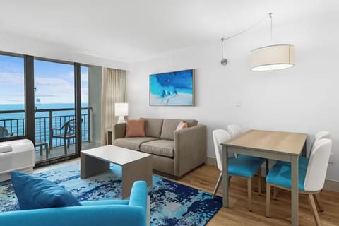 Gather for casual dinners in the bright seaside dining nook.