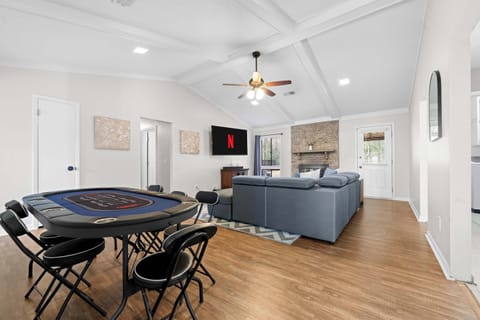 Dining and game area designed for shared meals and fun