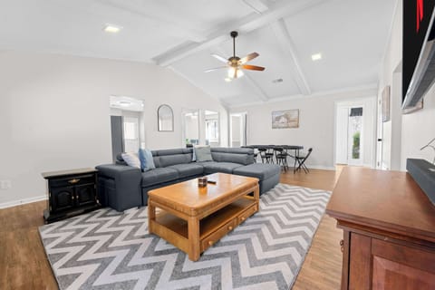 Modern living space with bright natural light and open layout
