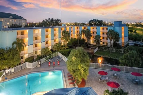 Savor sunset views over the resort and sparkling pool below.