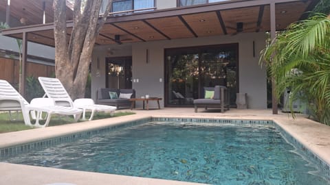Pool and house front view