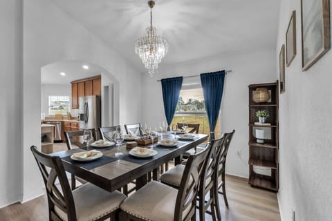 Comfortable dining space with natural light with seating for eight