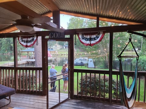 Relax in a hammock swing overlooking the lake.