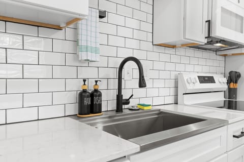 Pull down faucet with deep sink