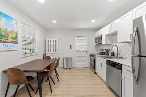 Renovated kitchen complete with dishwasher and full size refrigerator