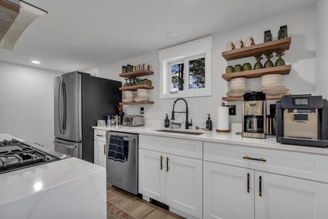 Everything you need within reach. Plates, mugs, gadgets, and a vibe that says stay awhile.