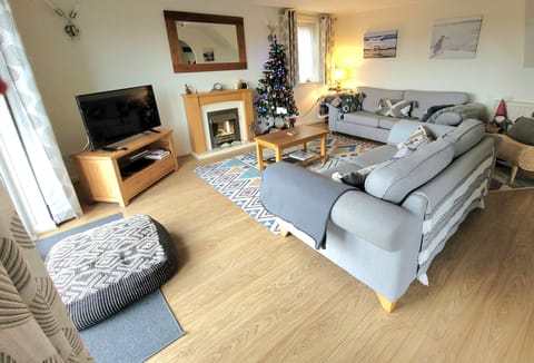 Langunnett Cottage, Looe. Ground Floor: Stay cosy in the lovely sitting room
