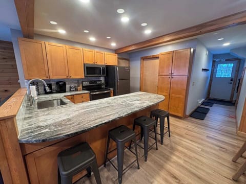 Fully Stocked Kitchen in open concept Living Room/Dining Room area