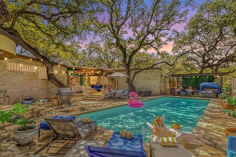 Twilight pool views with cozy lighting — ideal for evening swims and outdoor gatherings.