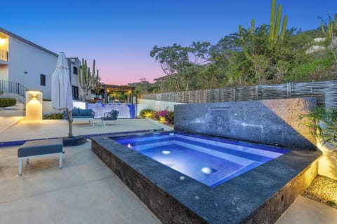 Relaxing jacuzzi surrounded by quiet desert landscapes.