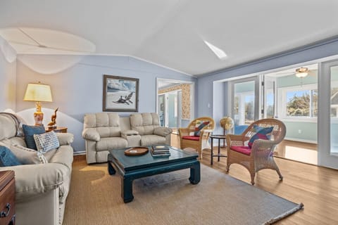 Spacious living room with comfortable seating and privacy.