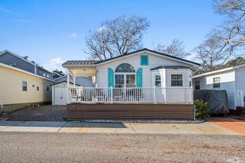 Charming front porch perfect for morning coffee and sunsets