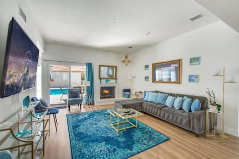 his inviting living space offers cozy seating, a fireplace, and Smart TV—perfect for relaxing after a day of exploring.