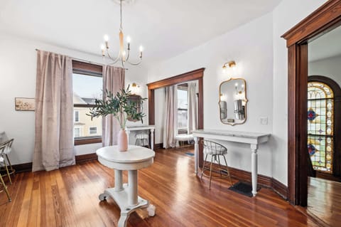 Living Area: A pretty-in-pink living area made for cozy moments and cute vibes with your girls!