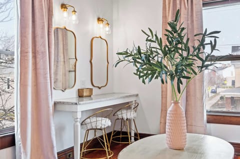 Living Area: A pretty-in-pink living area made for cozy moments and cute vibes with your girls!