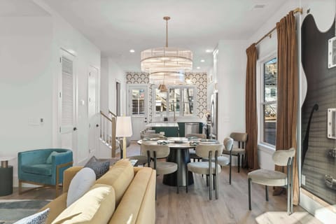 Inviting seating area with accent chairs and coffee table—ideal for conversation, morning coffee, or winding down in the evening.