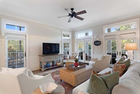 Large Open Living Room With Balcony Access